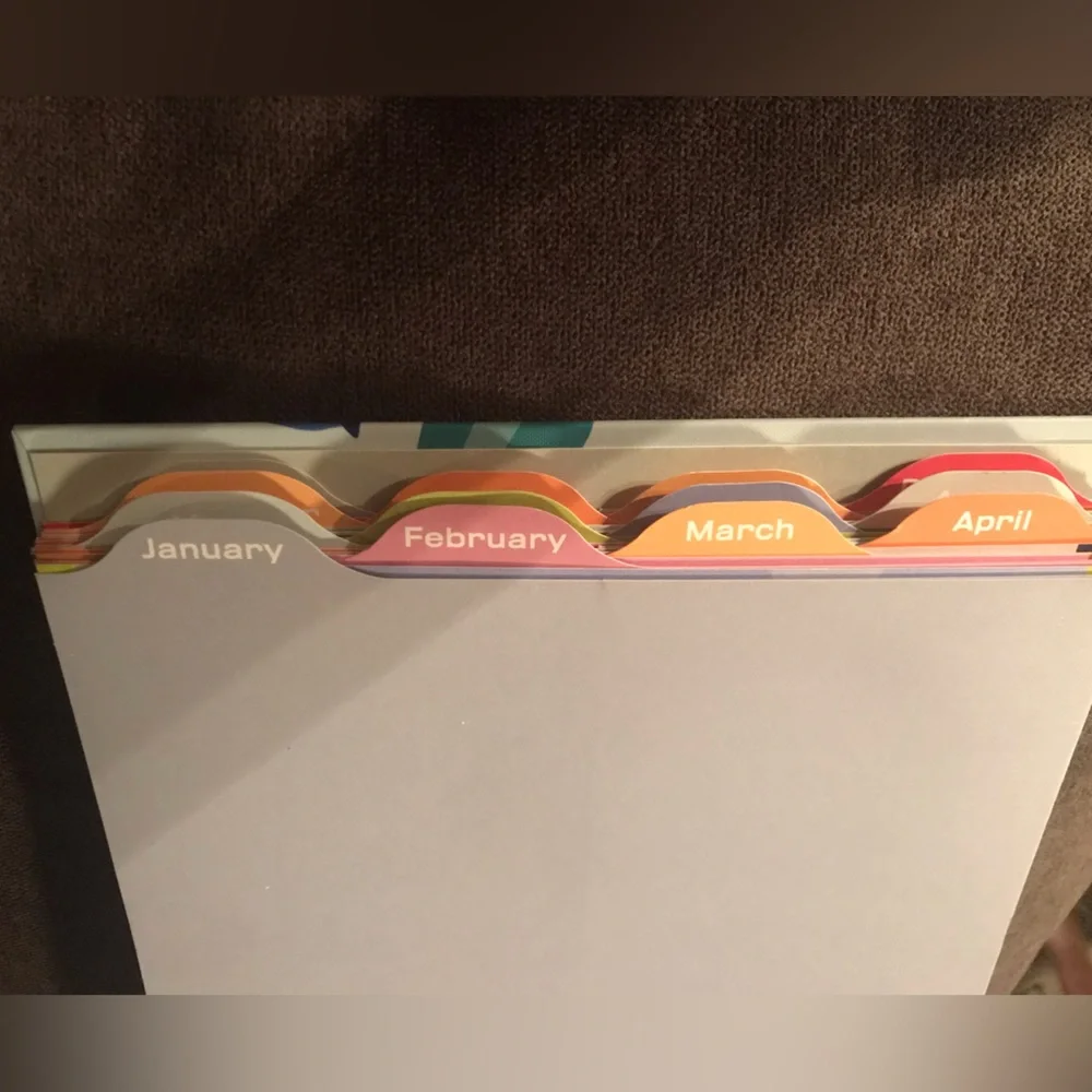 Special days monthly note/card holder with pockets on one side & days on other.